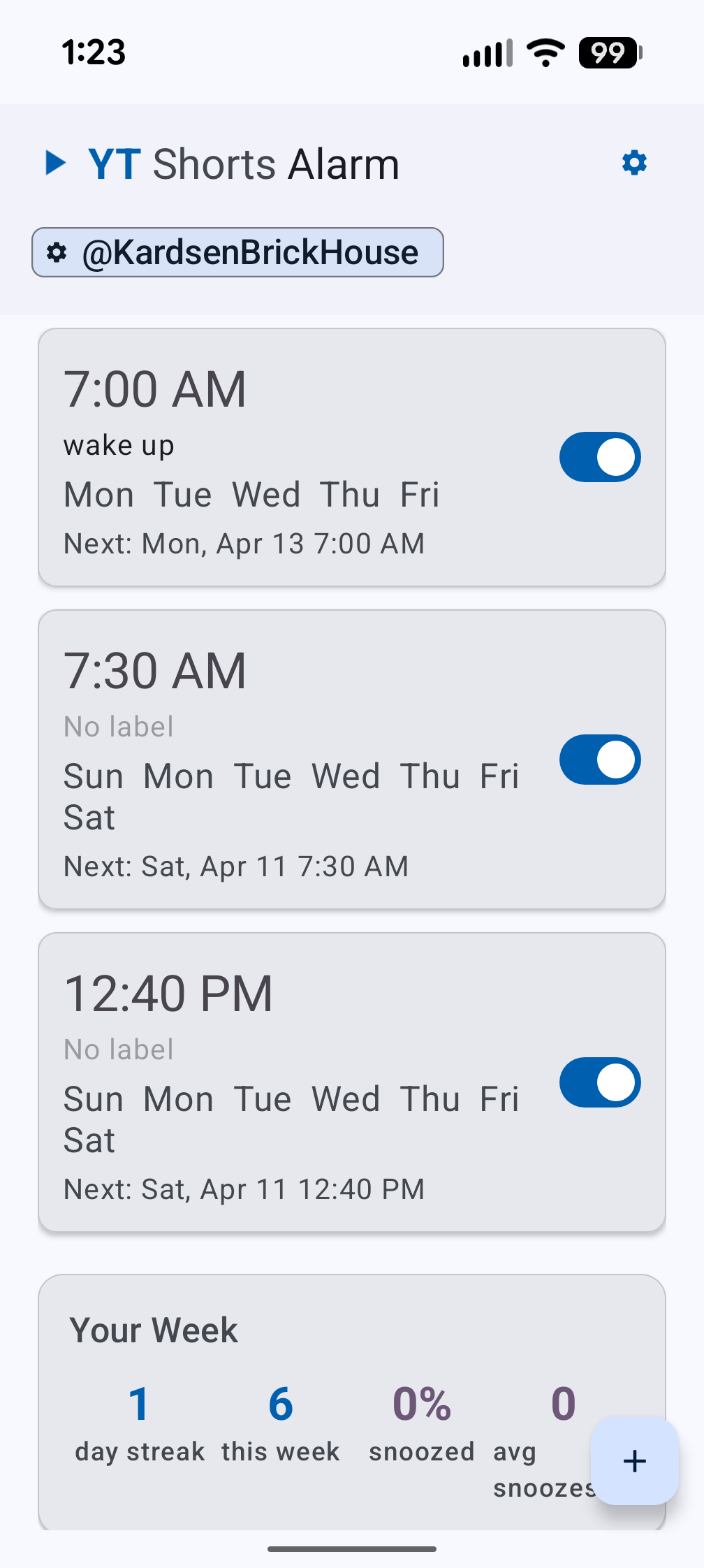 Alarm dashboard in light mode with blue accent colors, Material 3 cards, and Your Week stats